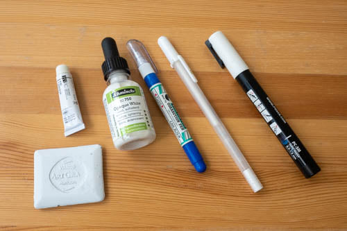 White gel pen, white markers, paint and ink